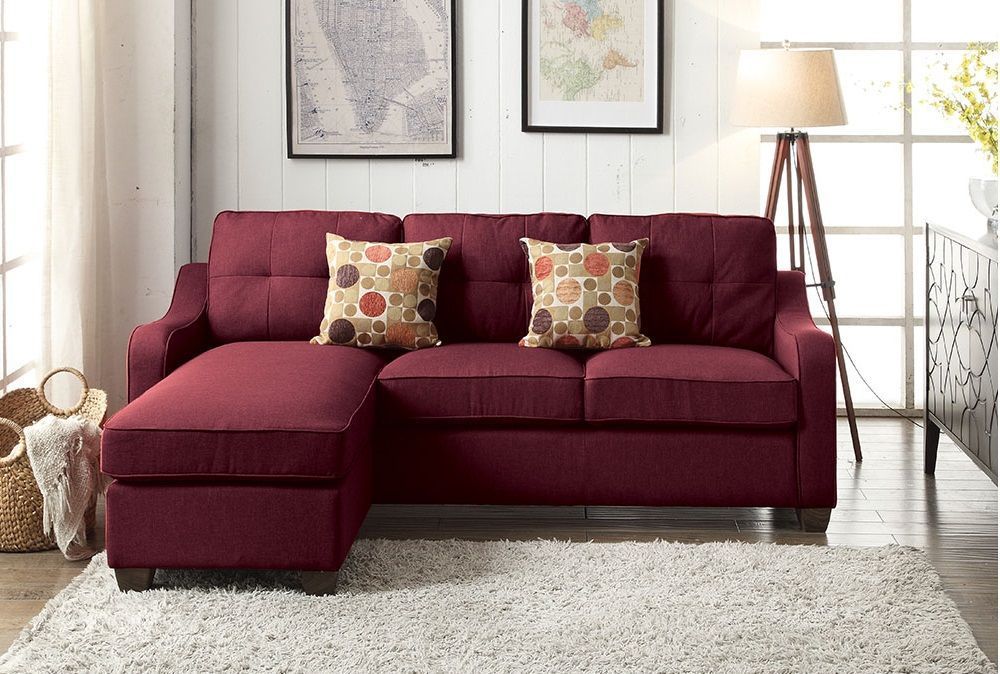 Cleavon II Sectional Sofa with 2 Red Pillows