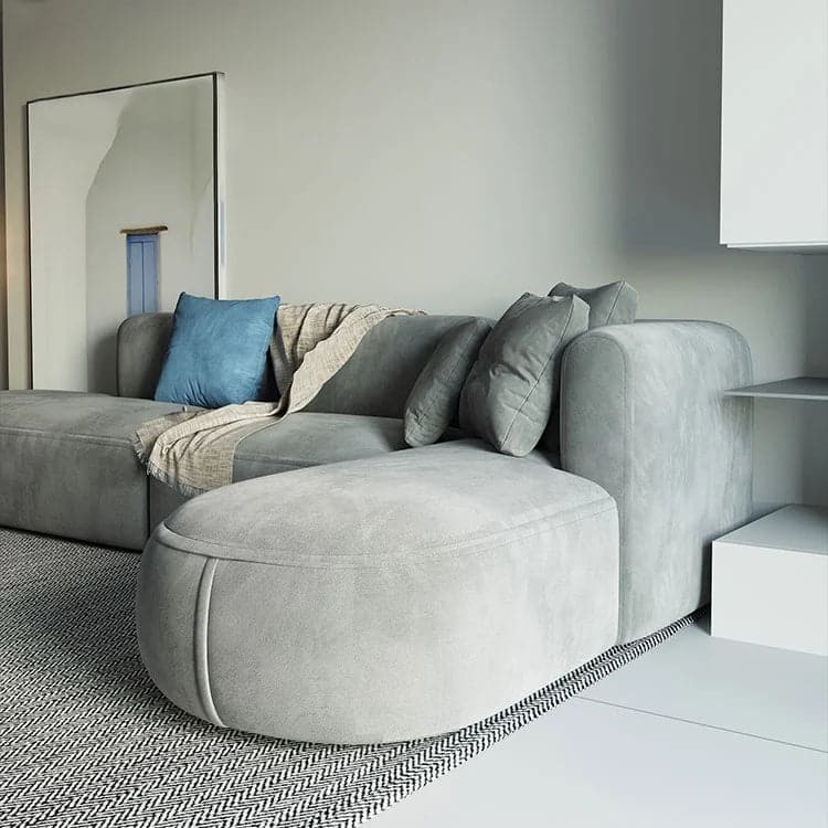 L-Shaped Modular Corner Sofa with Gray Pillows