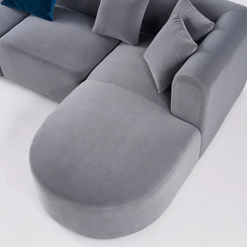 L-Shaped Modular Corner Sofa with Gray Pillows